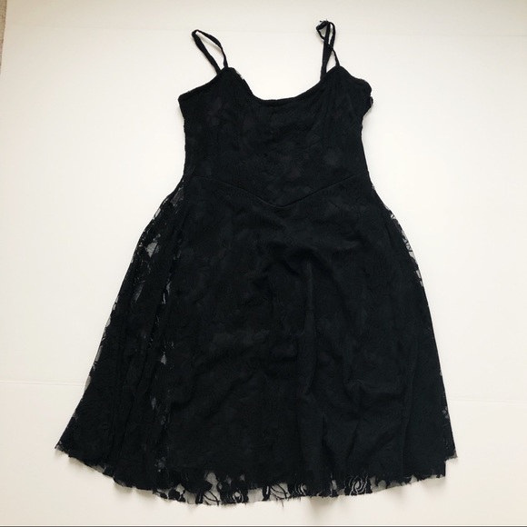 Dresses & Skirts - Black lace dress with floral detail.